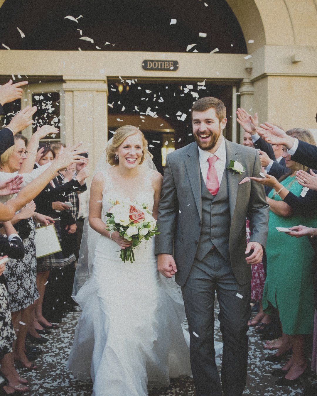 A couple's first dance under warm light